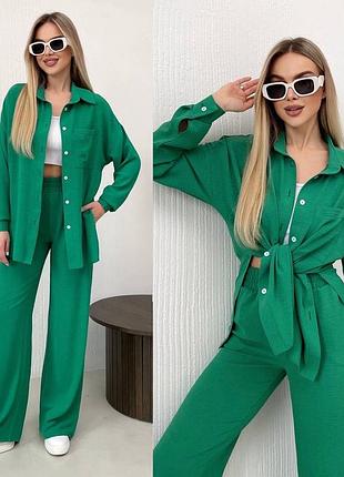 Жіночий зелений брючний костюм жатка батал