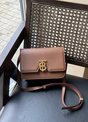 Жіноча шкіряна сумка the burberry luxe біла чорна коричнева