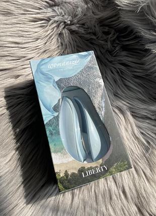 Вакуумний стимулятор кліторальний  вібратор womanizer liberty блакитний