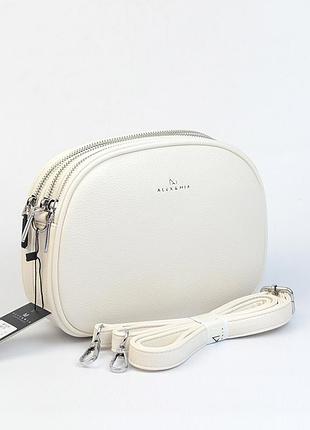 Белая женская маленькая овальная сумка кросс боди на три отделения