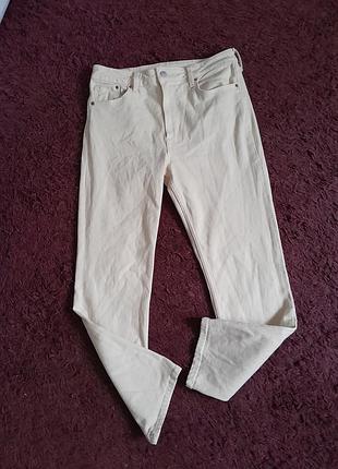 Фврменные джинсы бежевые в идеале размер42