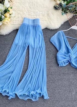 Жіночий костюм літній легкий повітряний прозорі штани брюки палаццо широкі вільного крою з шортиками шортами на резинці і + топ шифоновий блакитний