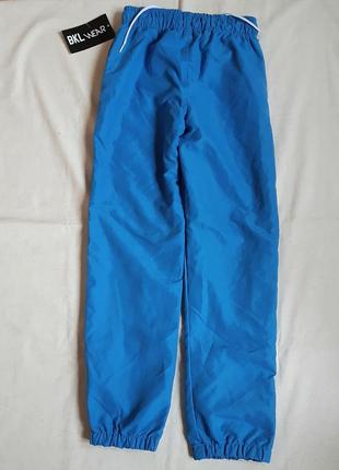 Голубые плащевые спортивные штаны bkl wear нижняя нижняя на 12 лет3 фото