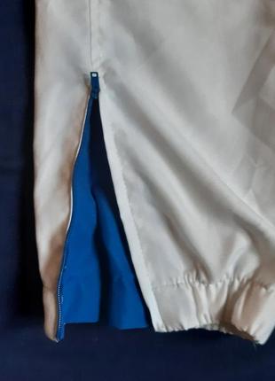 Джоггеры белые плащевые спортивные штаны bkl wear германия на 10 лет2 фото