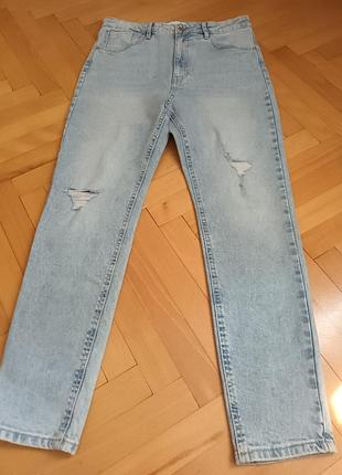 Джинсы женские голубого цвета
