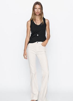 Розкльошені джинси скіні massimo dutti