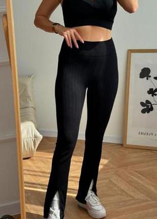 Женские брюки в рубчик с розрезами