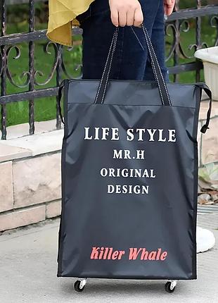 Дорожная сумка на колесах черная 38 литров style