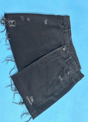 Чорна джинсова спідниця з асиметричними поясом