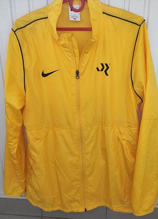Нова сток  спорт фірмова курточка вітрівка.nike.л