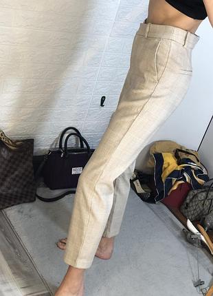 Бежеві штани класичні ділові брюки невиразна клітинка
