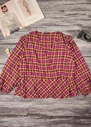 Жіноча блуза на запах в клітинку