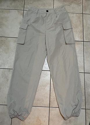 Штани карго з кишенями