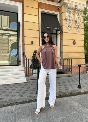 Блузка с изящными складками на груди без рукавов