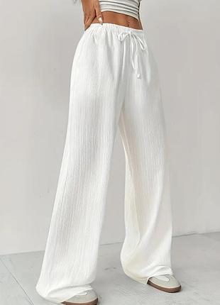 Жіночі штани на високій талії