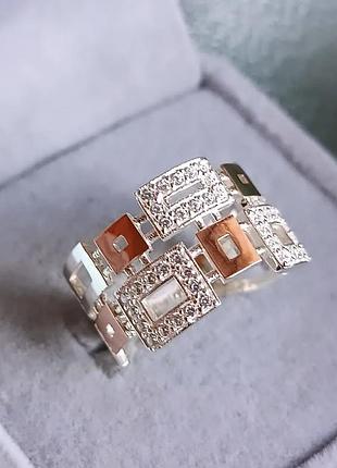 Срібна жіноча каблучка широка геометрична із золотом і фіанітами