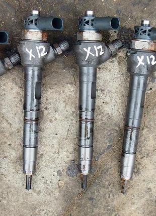 Форсунка vw audi 2.0 tdi 04l130277ak 0445110475