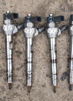 Форсунка vw audi 2.0 tdi 04l130277ac 0445110469