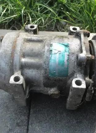 Компресор кондиціонера 7700111298