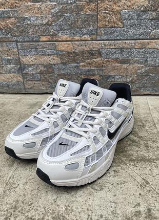 Білі кросівки nike p6000 - стильний вибір для повсякденного використання. легкі та зручні