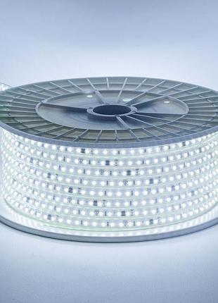 Світлодіодна стрічка холодна біла 220v герметична avt smd2835 120 led/м 9 вт/м ip65 11х5.5mm