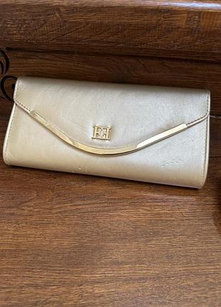 Сумочка-клатч золотистого кольору від escada