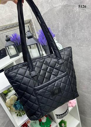 Женская сумочка- патрис из стеганной плащевки и вместительным карманом.