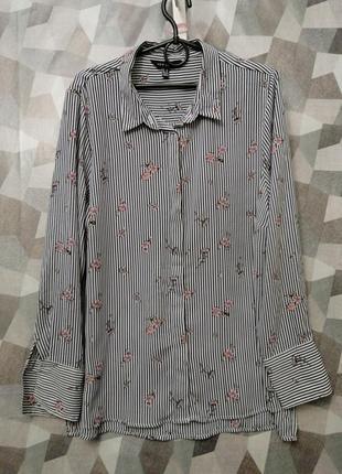 Блуза в смужку з квітковим принтом