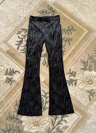 Розкльошені штани zara з блискітками