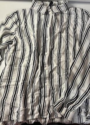 Блузка біла з лініями
