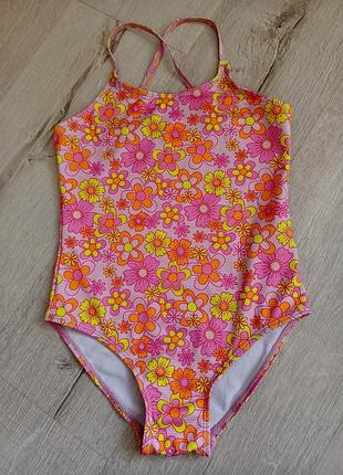 Яскравий суцільний купальник з квітковим принтом на дівчинку 8-9 років