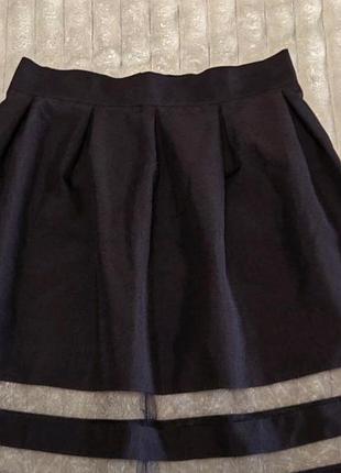 Юбка колокольчик,красивая,элегантная,ножки смотрятся великолепно,черная.