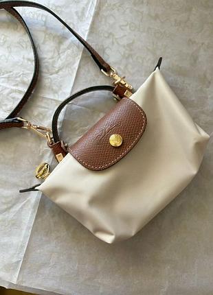 Сумка кросбоді longchamp pochette mini бежева