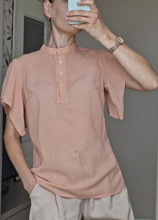 Персикова напівпрозора блуза поло