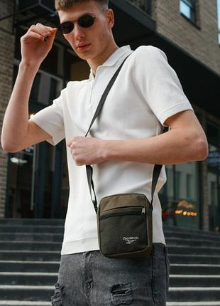 Барсетка хаки мини reebok белый логотип