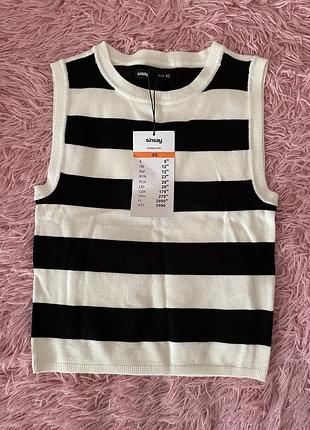 Жіноча жилетка