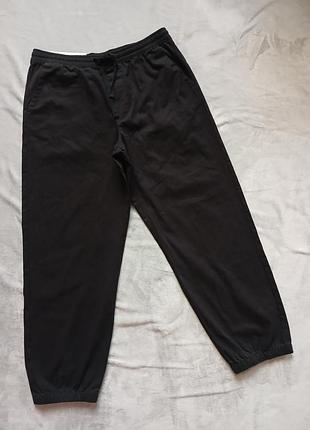 Чоловічі штани вільного крою на манжеті