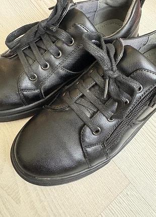 Кеди шкіряні