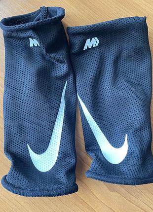 Тримачі щитків nike