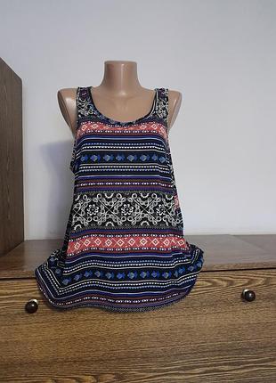 Майка гарна