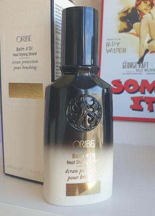 Термозащитный бальзам "растыш золота"
oribe balm d'or heat styling shield