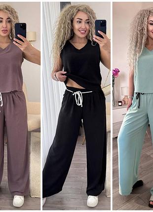Легкі жіночі брючні костюми креп жатка