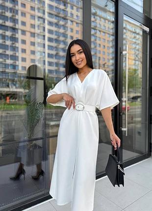 Елегантна сукня з поясом довжини міді