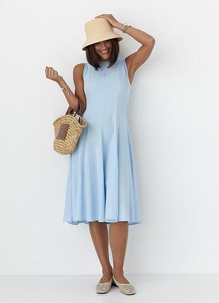 Сукня довжини міді без рукавів