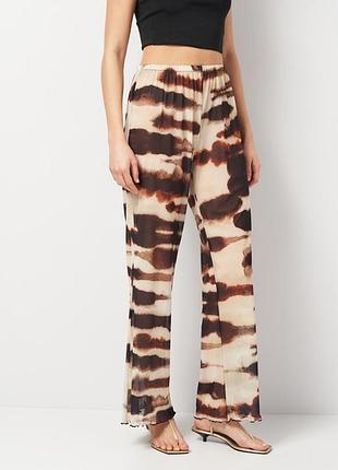 Стильные прозрачные широкие брюки