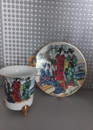 Кофейная чашка с блюдцем.