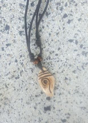 Кулони з кістки