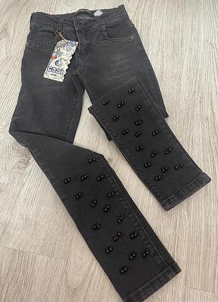 Джинси скіні чорного кольору для дівчинки 7-8 років