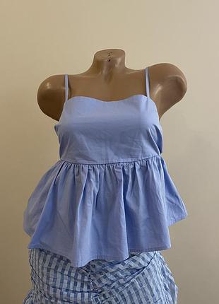 Блакитний топ babydoll з завʼязкою бантом і воланами