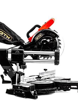 Ручная торцовочная пила с протяжкой по дереву gtm hm9085: 1800 вт, глубина реза 65 мм, диск 210 мм, вес 13 кг